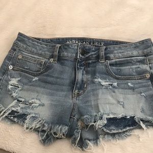 Distressed denim shorts